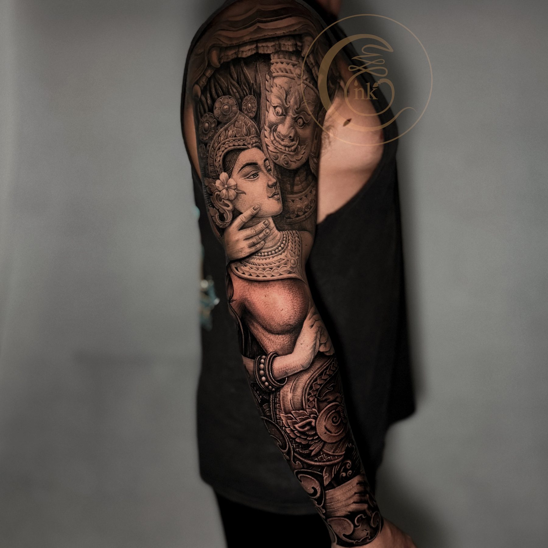 Black and gray realism sleeve detail — Apsara portrait and guardian figure