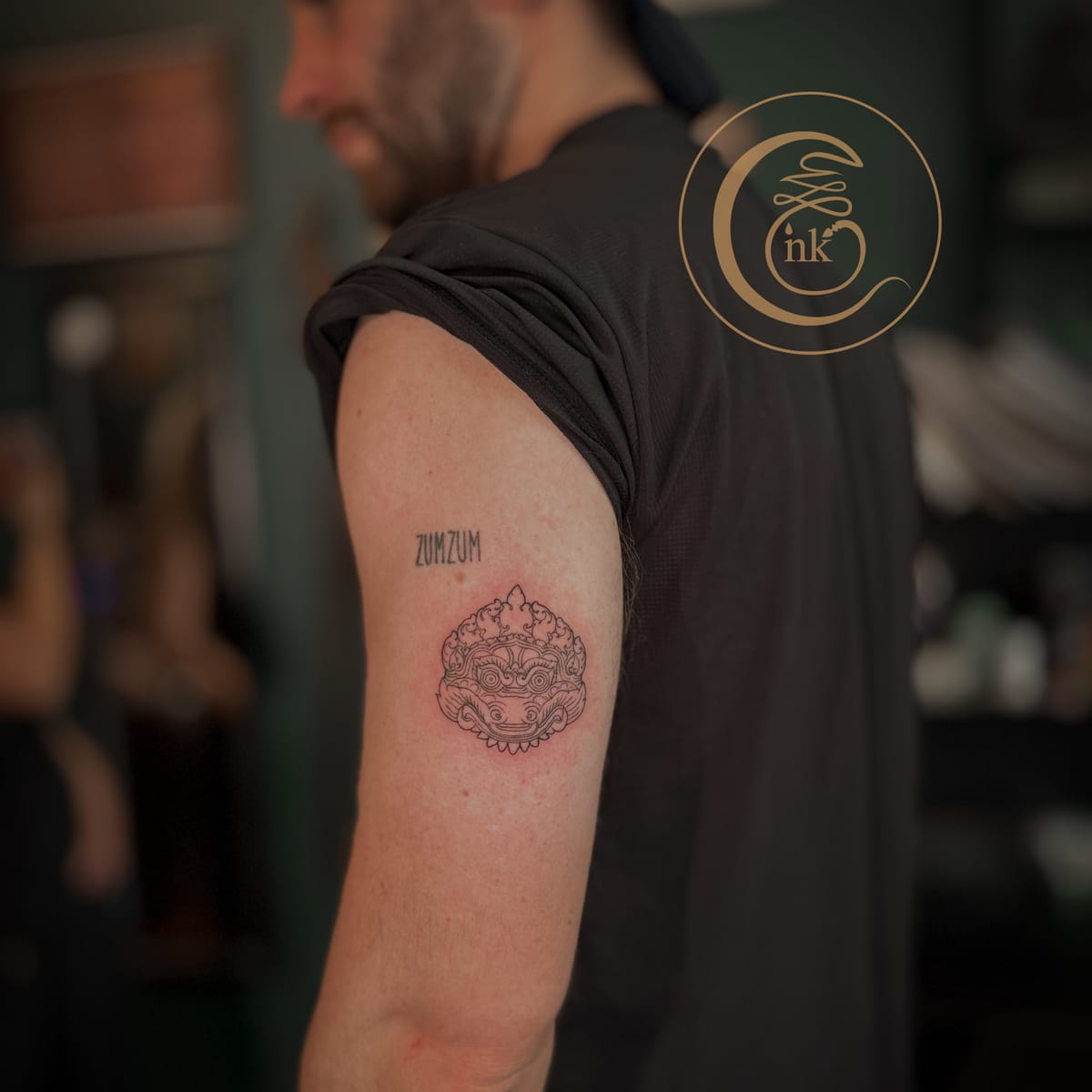 Detailed view of a Khmer Rahu tattoo in traditional machine style.