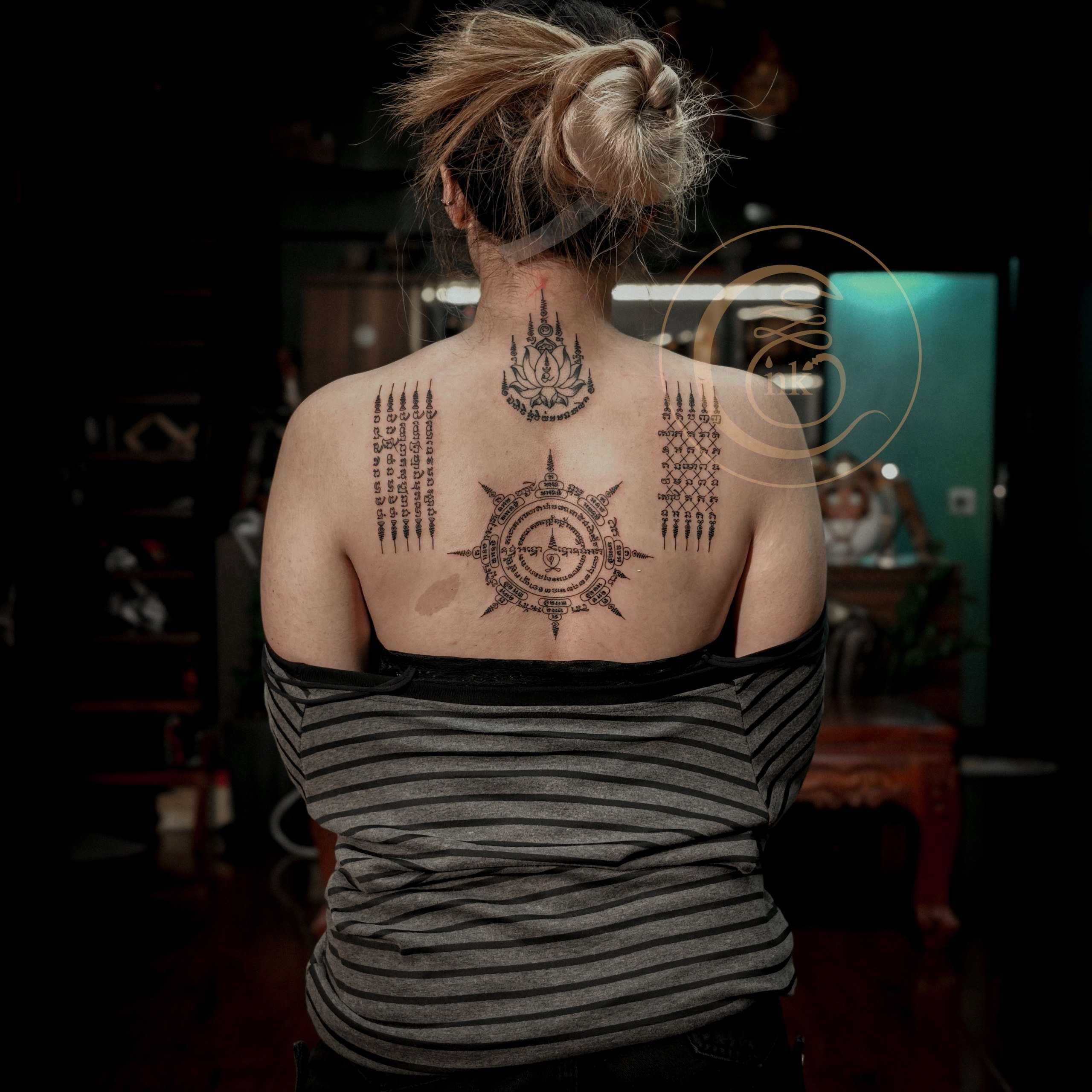 Set of Sak Yant tattoos on a visitor from France