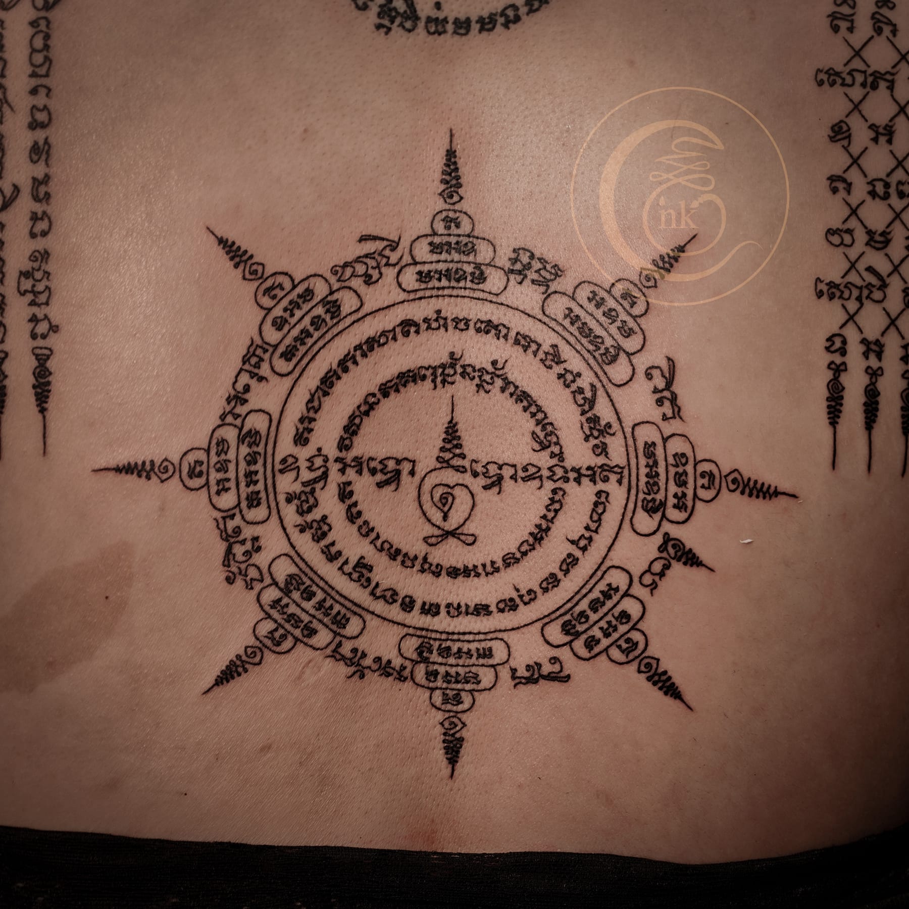 Eight-Direction Yant (Simā) tattooed across the back